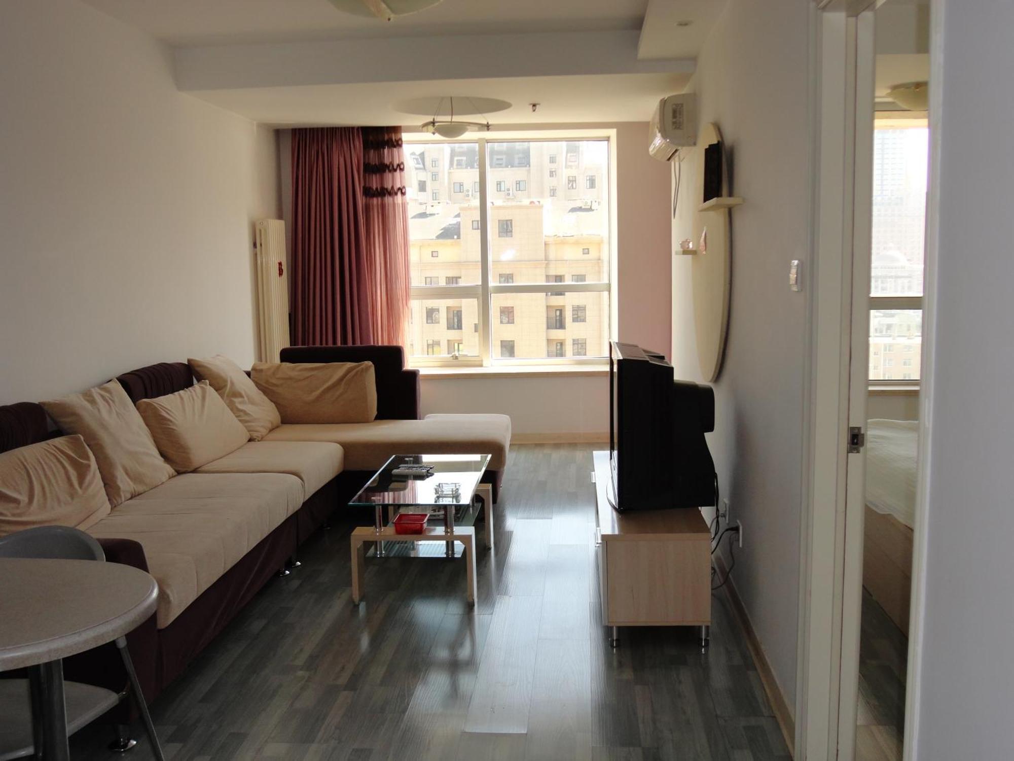 Dalian Xiuzhu Mansion Apartment Rum bild